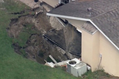 Sink -Hole swallows part of a Florida Home