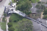 many homes affected by care collapse, Crane collapse on many homes, crane collapses on to several homes in florida, Crumbled